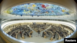 FILE - Overview of the Human Rights Council at the United Nations in Geneva, Sept. 12, 2022. Picture taken with a fish-eye lens.