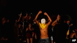 People protest asking for the restoration of the electrical service that collapsed last Tuesday due to the devastation of Hurricane Ian in Bacuranao, Sept. 30, 2022. 