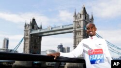 FILE - Britain's Mo Farah poses near Tower Bridge in London, April 17, 2018.