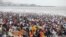 Visitors pack a crowded beach in Mumbai, India, June 12, 2022. The U.N.'s population projection predicts India will overtake China as the world's most populous country by next year. 