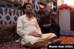 Babloo, left, visits one of her best friends Sameer, who recently underwent heart surgery. (Photo by Wasim Nabi)