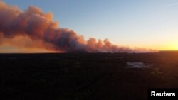 Šumski požar na jugu Franuckse, 12 jula 2022. Foto: Twitter @Dgamax/via Reuters.