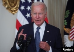 U.S. President Joe Biden speaks during a bill signing ceremony of the Inflation Reduction Act of 2022, in the State Dining Room of the White House in Washington, Aug. 16, 2022.