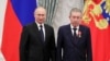 FILE - Russian President Vladimir Putin stands next to Lukoil executive Ravil Maganov after awarding him the Order of Alexander Nevsky during a ceremony at the Kremlin, in Moscow, Russia, Nov. 21, 2019. (Sputnik/Mikhail Klimentyev/Kremlin via Reuters)