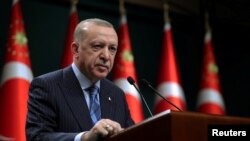 FILE - Turkish President Recep Tayyip Erdogan speaks after a cabinet meeting in Ankara, Turkey, May 17, 2021. (Murat Cetinmuhurdar/PPO/Handout via Reuters)