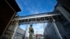 FILE - A Russian serviceman guards an area of the Zaporizhzhia Nuclear Power Station in territory under Russian military control, southeastern Ukraine, May 1, 2022. Russia and Ukraine have trade blame over shelling of the plant.