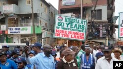 Nigeria Labour union protest in solidarity with the Academic Staff Union of Universities, on the street in Lagos, Nigeria, Tuesday, July 26, 2022. 