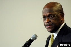 FILE - Former Republican presidential hopeful Herman Cain speaks at the National Press Club in Washington, Jan. 24, 2012.