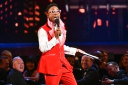 FILE - This June 9, 2019 file photo shows Billy Porter speaking at the Tony Awards in New York. Porter's outfit was made from curtains from the Tony Award-winning musical "Kinky Boots." He and other celebrities are wearing more vintage pieces.