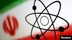 FILE - The atomic symbol and the Iranian flag are seen in this illustration, July 21, 2022.