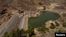 Aerial view of La Sorrueda reservoir in Santa Lucia de Tirajana at 10 percent of its capacity, in the island of Gran Canaria, Spain, Aug. 6, 2022. 
