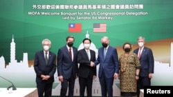 Taiwan Foreign Minister Joseph Wu attends a banquet for US Senator Markey, Representatives John Garamendi, Alan Lowenthal, Don Beyer and Aumua Amata Coleman Radewagen in Taipei, Aug. 25, 2022. (Taiwan Ministry of Foreign Affairs/Handout via Reuters) 