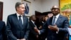 Democratic Republic of the Congo Prime Minister Jean-Michel Sama Lukonde, right, speaks as he meets with Secretary of State Antony Blinken, left, at the Primature in Kinshasa, Congo, Wednesday, Aug. 10, 2022. 