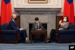 Taiwan's President Tsai Ing-wen meets with U.S. Democrat Sen. Ed Markey of Massachusetts at the Presidential Office in Taipei, Taiwan, Aug. 15, 2022. (Taiwan Presidential Office via AP)