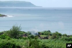 台灣軍隊在屏東楓港舉行重炮實彈射擊演練。（2022年8月9日）