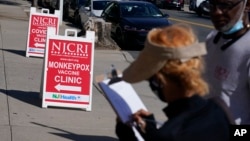 People line up to receive the monkeypox vaccine at a walk-in clinic at the North Jersey Community Research Initiative in Newark, New Jersey, Aug. 16, 2022.