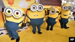FILE - Minions characters arrive at the Los Angeles premiere of "Minions: The Rise of Gru," on June 25, 2022, at the TCL Chinese Theatre in Los Angeles. (Photo by Richard Shotwell/Invision/AP)