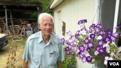 Dallas Britt of Auburn, Washington, is one of six Pacific Northwest veterans who journeyed to Tokyo this month with a special cargo of World War II flags. (Photo - T. Banse/VOA)