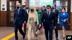 From left U.S. Democrat Sen. Ed Markey of Massachusetts, left, and Democratic House member John Garamendi of California, second left, back, arrive with their wives at the parliament building in Taipei, Taiwan, Aug. 15, 2022. 