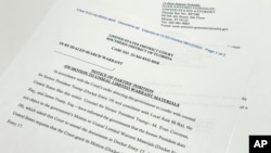 The notice filed by the Justice Department to the U.S. District Court South District of Florida informing the judge lawyers for fmr President Donald Trump didn't object to the government's motion to unseal the search warrant is photographed on Aug. 2022.
