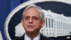 FILE - Attorney General Merrick Garland speaks at the Justice Department, Aug. 11, 2022, in Washington.