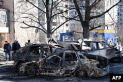 A view of the cars which were destroyed by recent shelling in Kyiv outskirts, Ukraine, Feb. 28, 2022