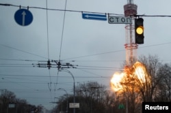 A blast is seen at a TV tower, amid Russia's invasion of Ukraine, in Kyiv, March 1, 2022.