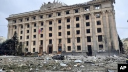 This handout photo released by Ukrainian Emergency Service shows a view of the damaged City Hall building in Kharkiv, Ukraine, Tuesday, March 1, 2022. (Ukrainian Emergency Service via AP)