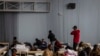 African students who studied in Ukraine are seen in temporary accomodations in a sports hall in Przemysl, eastern Poland, Feb. 28, 2022. Seventeen students from Ghana managed to make it back to their home country Tuesday. 