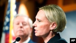 Rep. Victoria Spartz, R-Ind., who emigrated from Ukraine, speaks during a press conference about a Senate resolution calling for accountability for Russian President Vladimir Putin, March 2, 2022, at the Capitol in Washington.