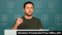 Ukrainian President Volodymyr Zelenskyy speaks to the nation in Kyiv, Feb. 27, 2022