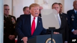 President Donald Trump addresses the nation from the White House on the ballistic missile strike that Iran launched against Iraqi air bases housing U.S. troops, Jan. 8, 2020, in Washington. 