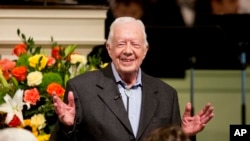 FILE - Former President Jimmy Carter teaches Sunday School class at Maranatha Baptist Church in his hometown of Plains, Georgia, Aug. 23, 2015. Audio recordings from his classes just earned the late president a Grammy.