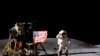 In this April 1972 photo made available by NASA, John Young salutes the U.S. flag at the Descartes landing site on the moon during the first Apollo 16 extravehicular activity. 