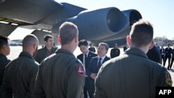 South Korea's Minister of National Defense Lee Jong-sup speaks with B-52 crew members during a visit at Andrews Air Force Base in Maryland on Nov. 3, 2022.