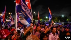 Cuba supporters protest ahead of bilateral talks between the US and Cuba in Washington held on April 21, in Miami, Florida, on April 20, 2022.