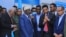 Somalia's newly elected upper house parliament speaker Adan Mohamed Nur, center, is seen after being elected at the airport complex in Mogadishu on April 28, 2022. 