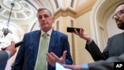 House Minority Leader Kevin McCarthy, R-Calif., talks to reporters at the Capitol in Washington, April 6, 2022.