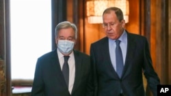 Russian Foreign Minister Sergey Lavrov, right, welcomes U.N. Secretary-General Antonio Guterres for the talks in Moscow, April 26, 2022.