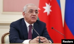 FILE - Azerbaijani Prime Minister Ali Asadov attends a meeting in Moscow, Russia, May 20, 2021. (Sputnik/Dmitry Astakhov/Pool via Reuters)