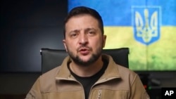 FILE - In this image from video provided by the Ukrainian Presidential Press Office, Ukrainian President Volodymyr Zelenskyy speaks from Kyiv, Ukraine, April 22, 2022.