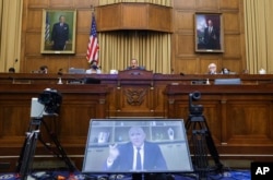 FILE - Amazon CEO Jeff Bezos speaks via video conference during a House Judiciary subcommittee hearing on antitrust on Capitol Hill in Washington, July 29, 2020.