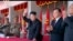 FILE - In an image made from video, North Korean leader Kim Jong Un, center, and Liu Yunshan, China's Communist Party's No. 5 leader, second right, waves during a ceremony to mark the 70th anniversary of the country's ruling party, in Pyongyang, Oct. 10, 