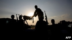 FILE - Somali National Army soldiers are seen in the Middle Shabelle region of Somalia, Dec. 10, 2012. (Stuart Price / AU-UN IST / AFP) 