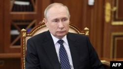 FILE - Russian President Vladimir Putin is pictured in Moscow, Jan. 5, 2023. On Friday, the International Criminal Court issued a warrant for Putin's arrest for war crimes because of his alleged involvement in the abduction of children from Ukraine.