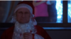 A screenshot from a Russian propaganda ad featuring Russia's President Vladimir Putin as Santa. (Telegram)