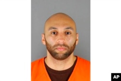 FILE - This photo provided by the Hennepin County Sheriff's Office in Minnesota, June 3, 2020, shows J. Alexander Kueng.
