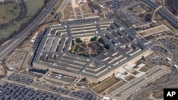 FILE - The Pentagon is seen from Air Force One as it flies over Washington, March 2, 2022. 
