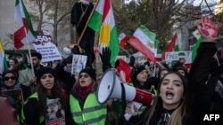  Protesters call on the United Nations to take action against the treatment of women in Iran, following the death of Mahsa Amini while in the custody of the morality police, during a demonstration near U.N. headquarters in New York City, Nov. 19, 2022. 