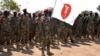 South Sudan soldiers at the Army headquarters in Juma prepare for deployment to the Democratic Republic of Congo, Dec. 28, 2022. (Sheila Ponnie/VOA)